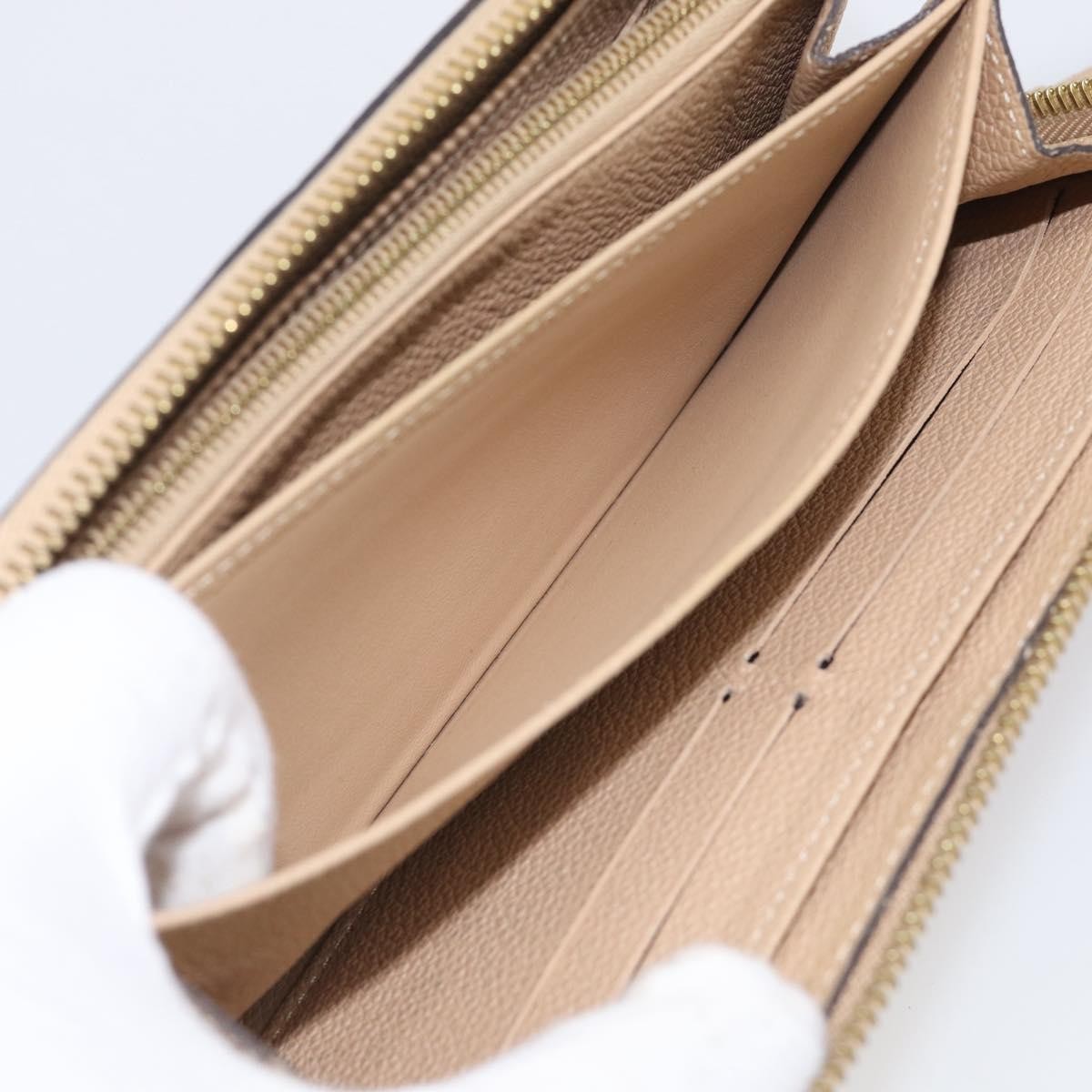 Louis Vuitton Zippy Monogram Empreinte Leather, Beige, Leather, Wallet
