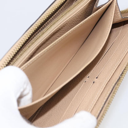 Louis Vuitton Zippy Monogram Empreinte Leather, Beige, Leather, Wallet