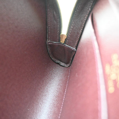 Louis Vuitton Pochette Baikal Clutch Taiga Leather, Burgundy, Leather, Clutch