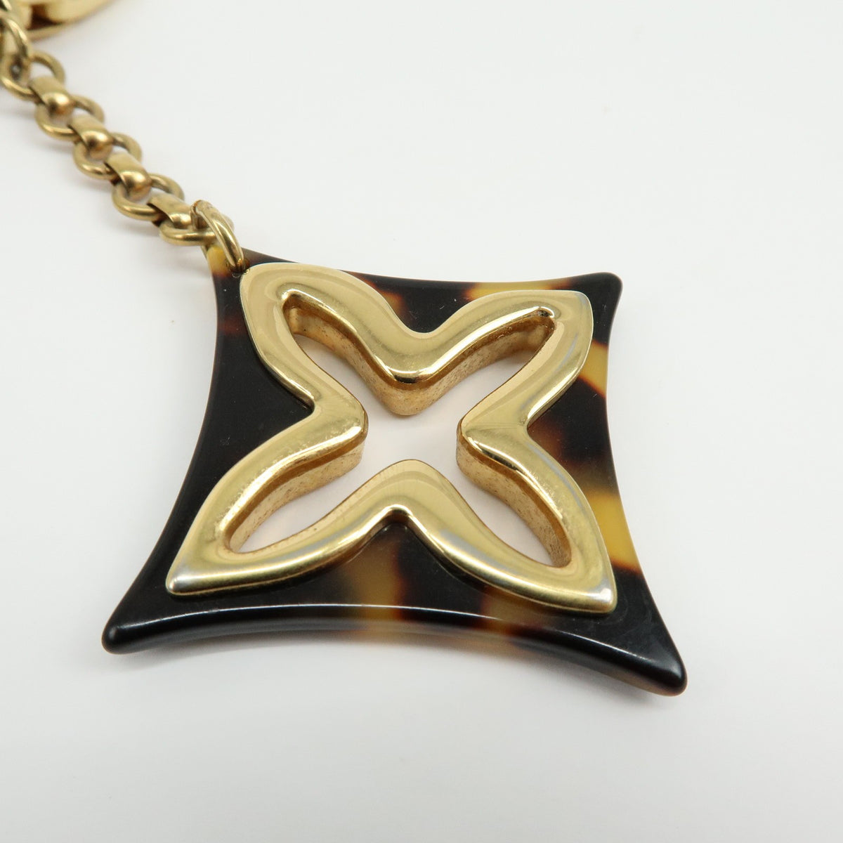 Louis Vuitton Insolence Bag Charm Metal and Tortoise, Gold, Metal, Charm