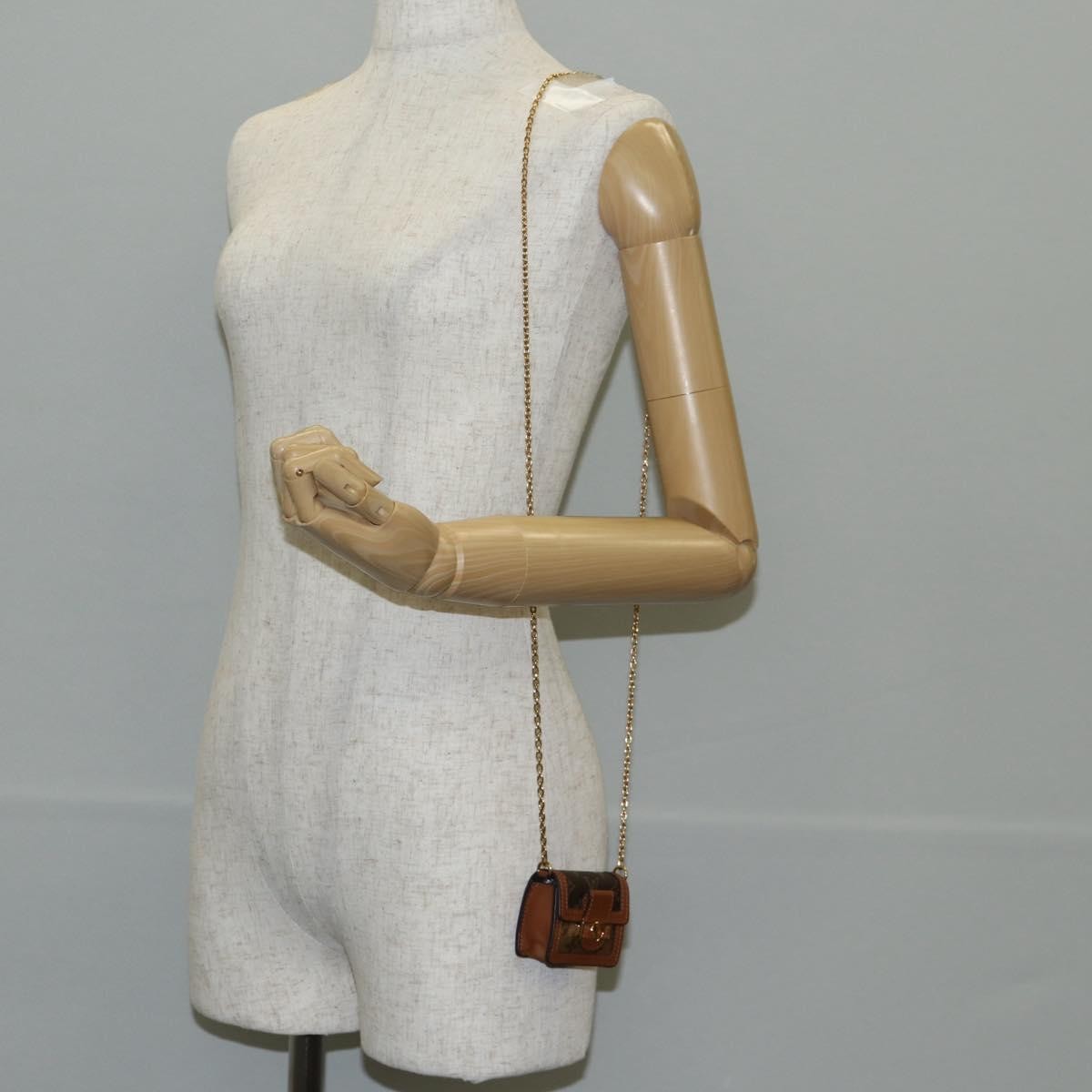 Louis Vuitton Dauphine Reverse Monogram Canvas, Brown, Canvas, Clutch