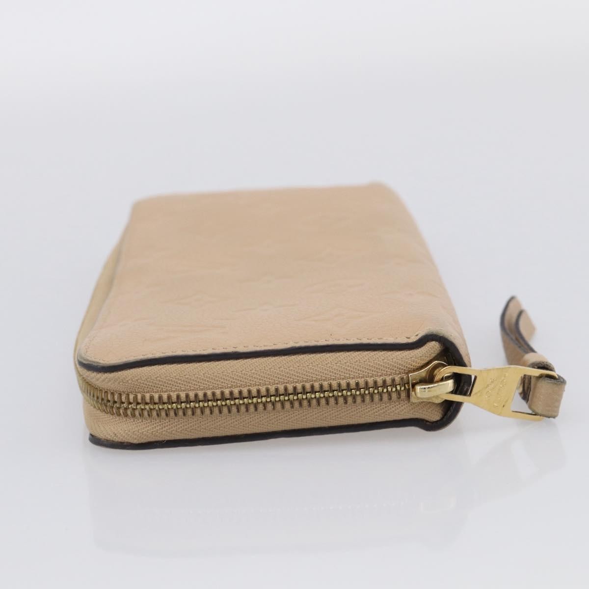 Louis Vuitton Zippy Monogram Empreinte Leather, Beige, Leather, Wallet