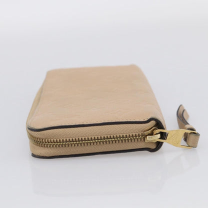 Louis Vuitton Zippy Monogram Empreinte Leather, Beige, Leather, Wallet