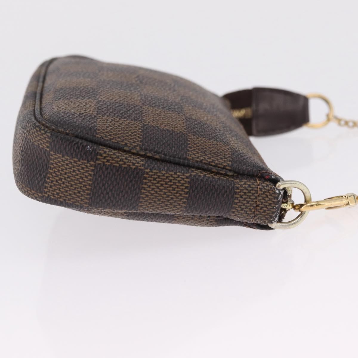 Louis Vuitton Mini pochette accessoires Damier Canvas, Brown, Canvas, Clutch