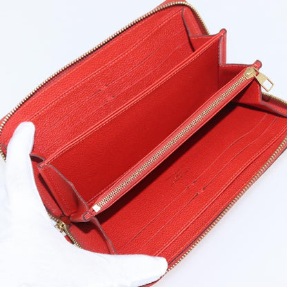Louis Vuitton Portefeuille zippy Monogramme Empreinte Monogramme Empreinte, Orange, Leather, Wallet