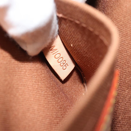 Louis Vuitton Pochette Marrell Monogram Canvas, Brown, Canvas, Clutch