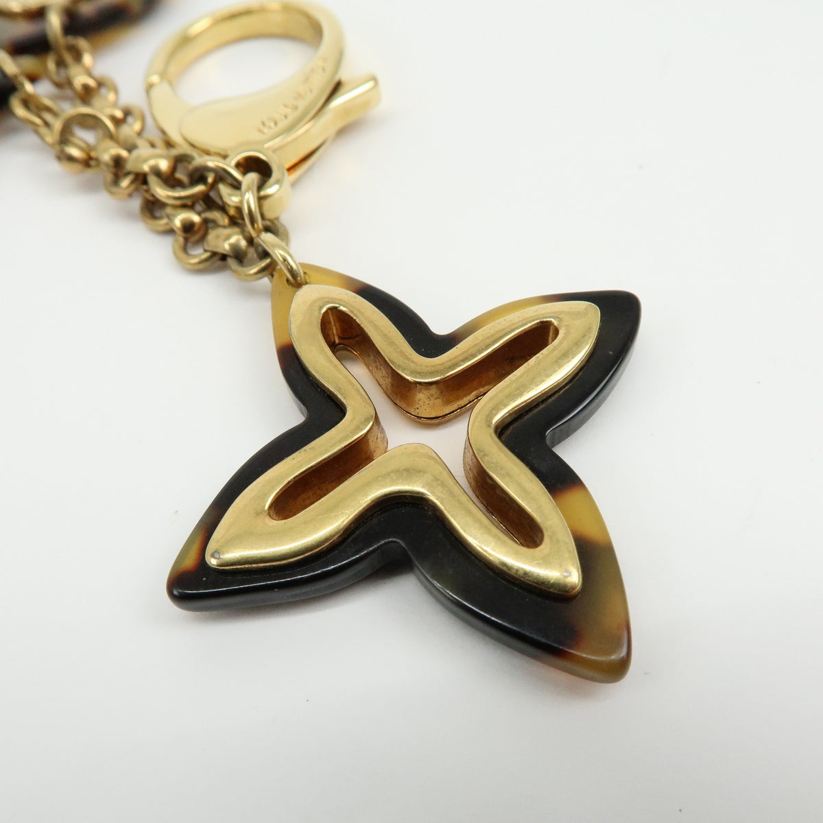 Louis Vuitton Insolence Bag Charm Metal and Tortoise, Gold, Metal, Charm