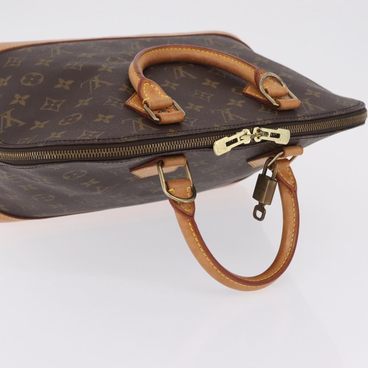 Louis Vuitton Alma Monogram Canvas, Brown, Canvas, Handbag