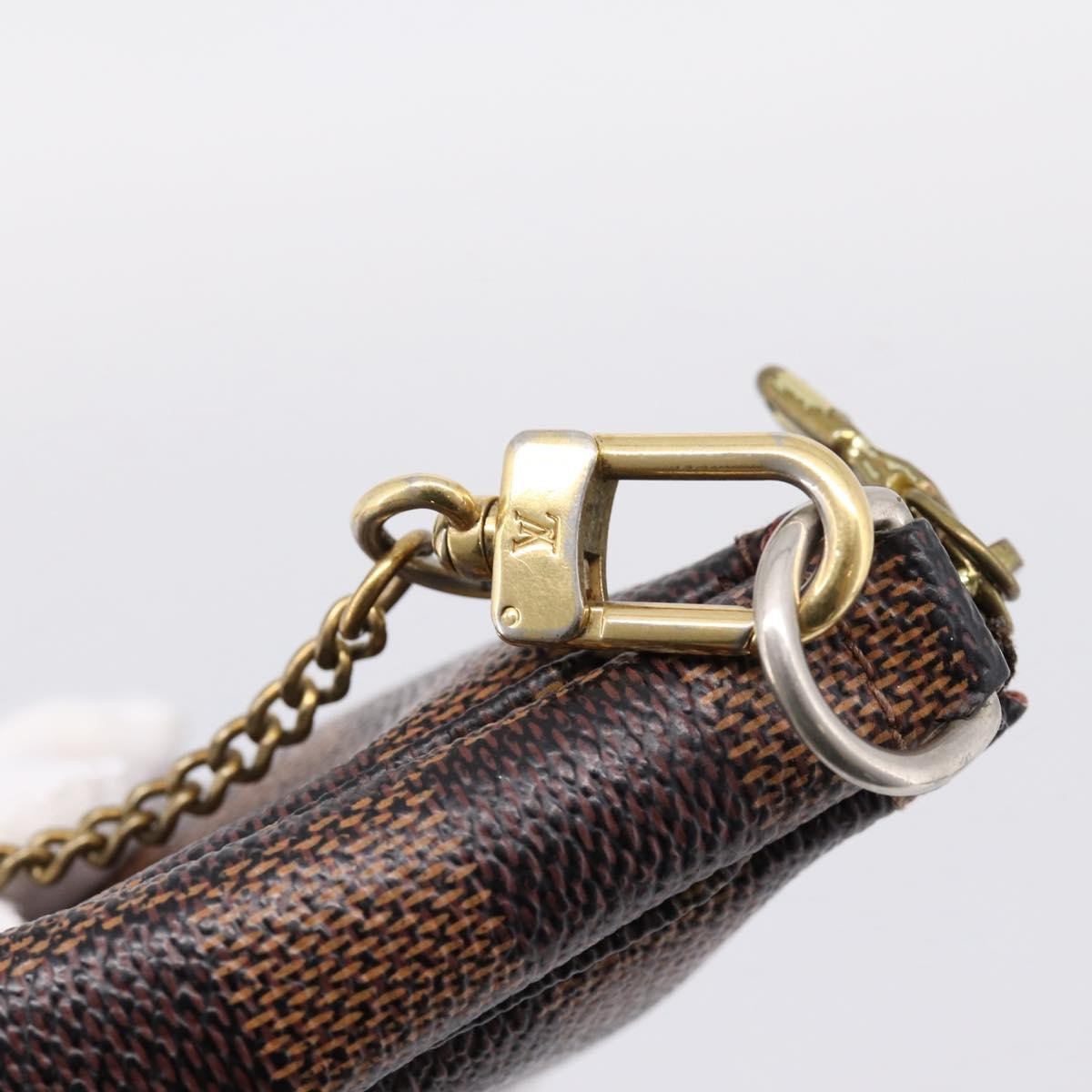 Louis Vuitton Mini pochette accessoires Damier Canvas, Brown, Canvas, Clutch