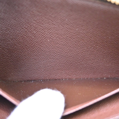 Louis Vuitton Porte-Monnaie Zippy Damier, Brown, Canvas, Wallet