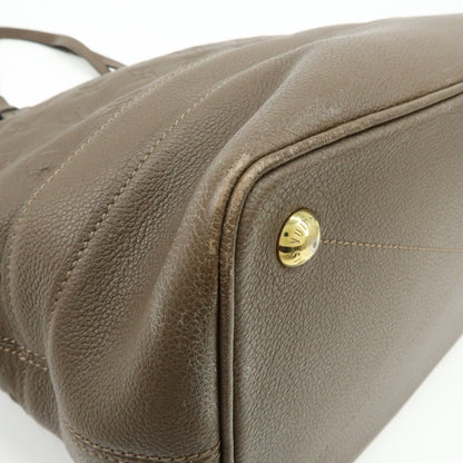Louis Vuitton Citadine Monogram Empreinte Leather, Brown, Leather, Handbag