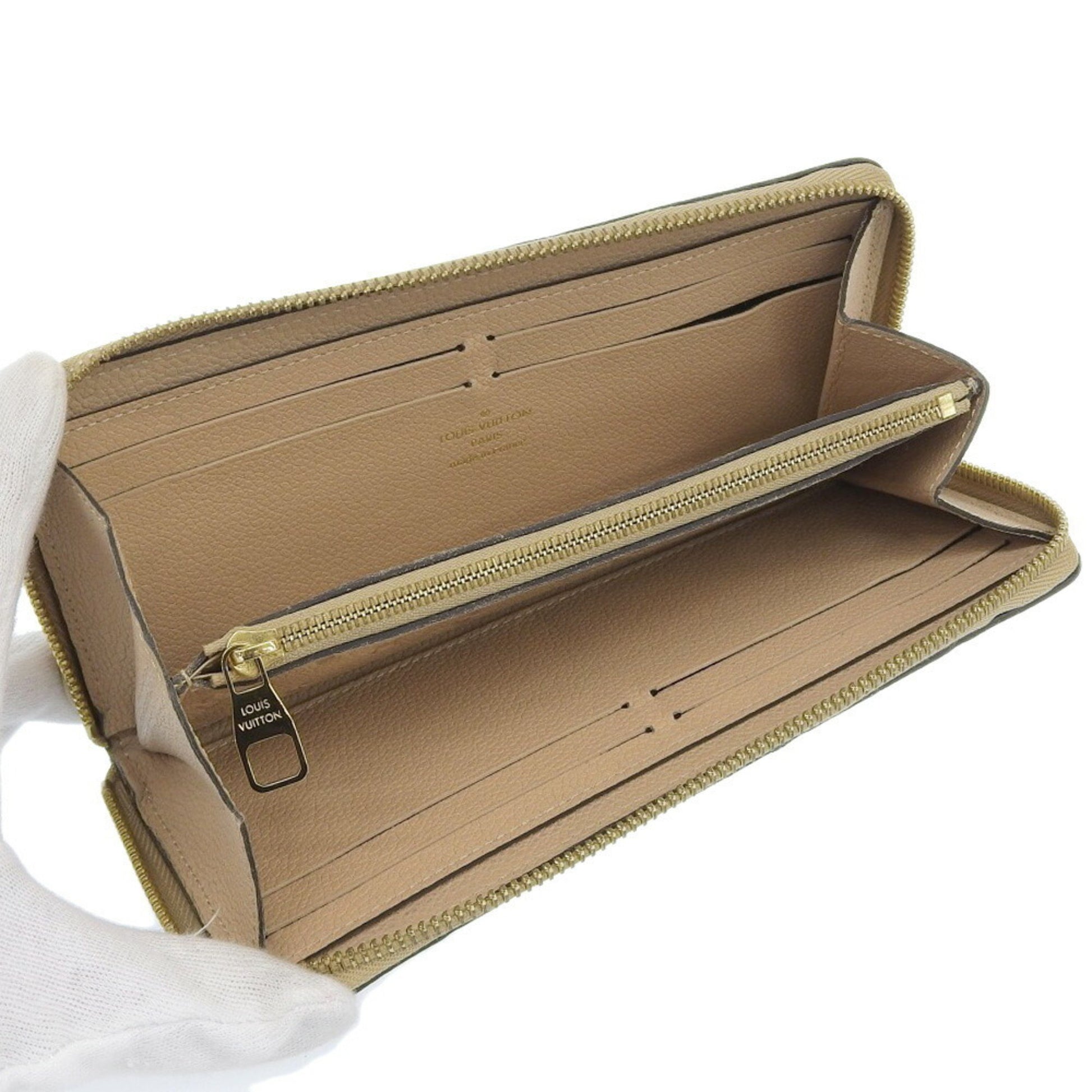 Louis Vuitton Portefeuille zippy, Beige, Canvas, wallet