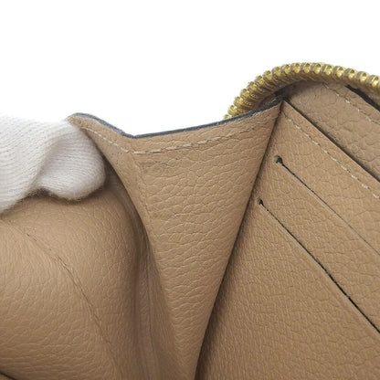 Louis Vuitton Portefeuille zippy, Beige, Canvas, wallet