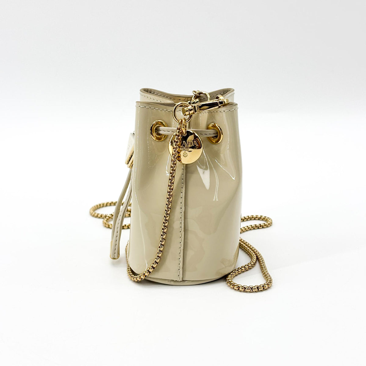 Prada Triangle Logo Drawstring Pouch Bucket Patent, Beige, Patent Leather, Clutch