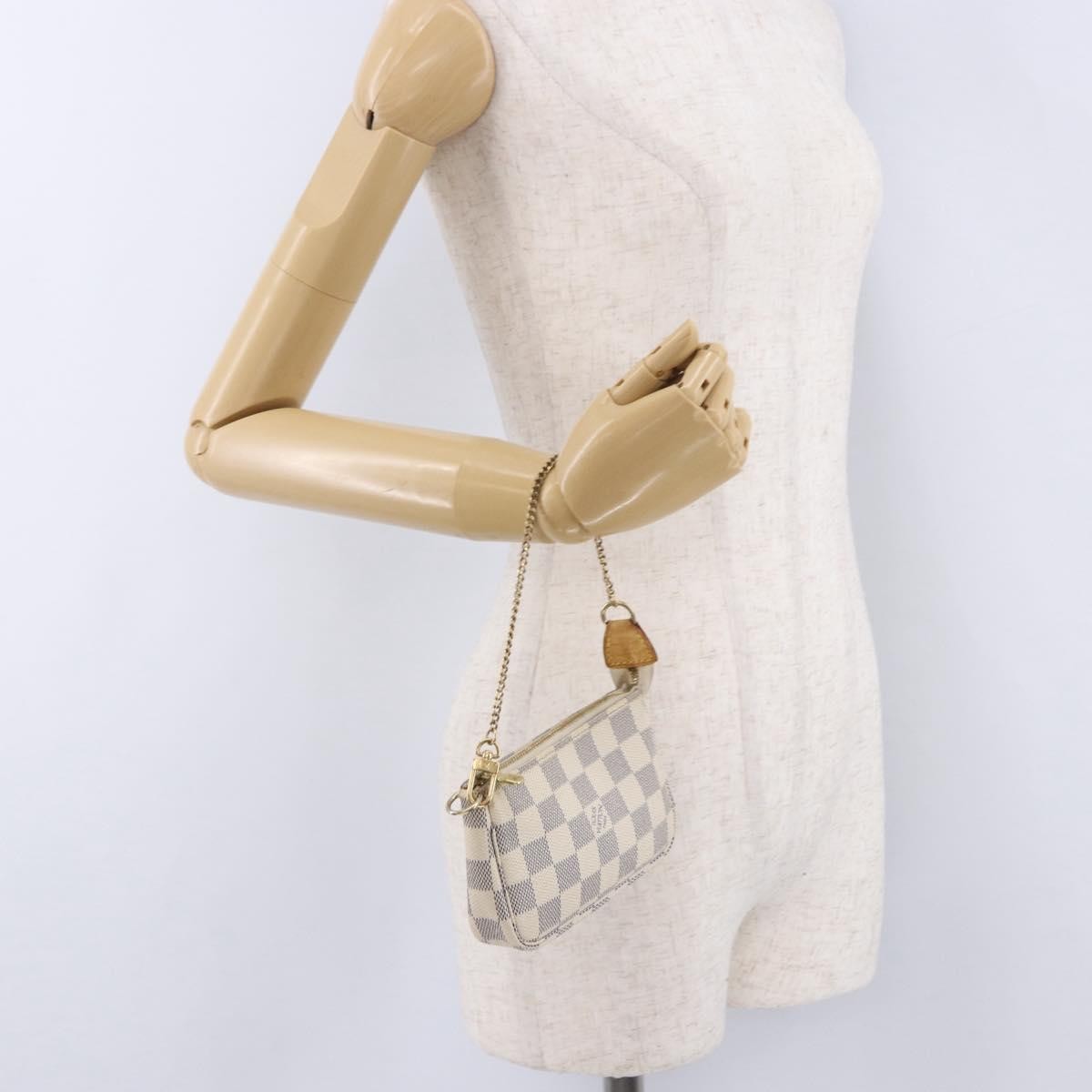 Louis Vuitton Mini pochette accessoires Damier Canvas, Beige, Canvas, Clutch
