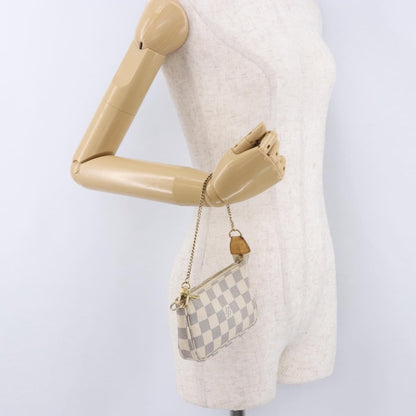 Louis Vuitton Mini pochette accessoires Damier Canvas, Beige, Canvas, Clutch