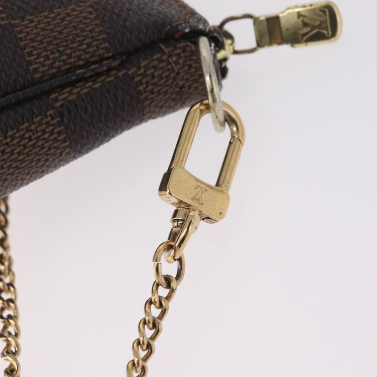 Louis Vuitton Mini pochette accessoires Damier Canvas, Brown, Canvas, Clutch