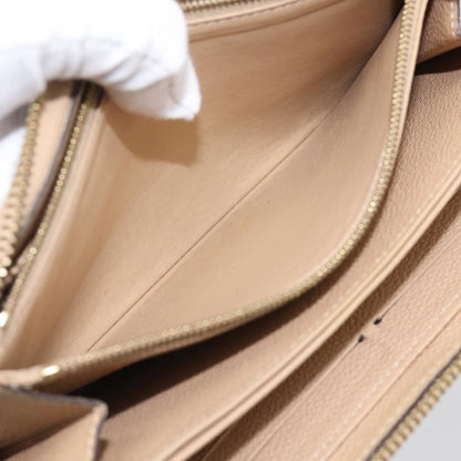 Louis Vuitton Zippy Monogram Empreinte Leather, Beige, Leather, Wallet