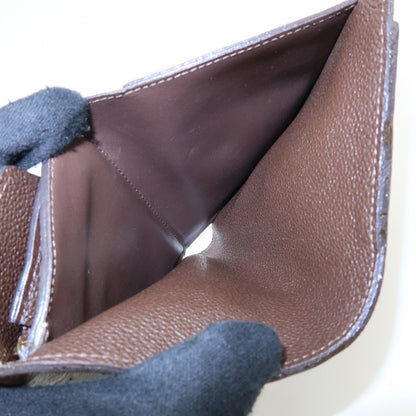 Louis Vuitton Curieuse Monogram Empreinte Leather, Brown, Leather, Wallet