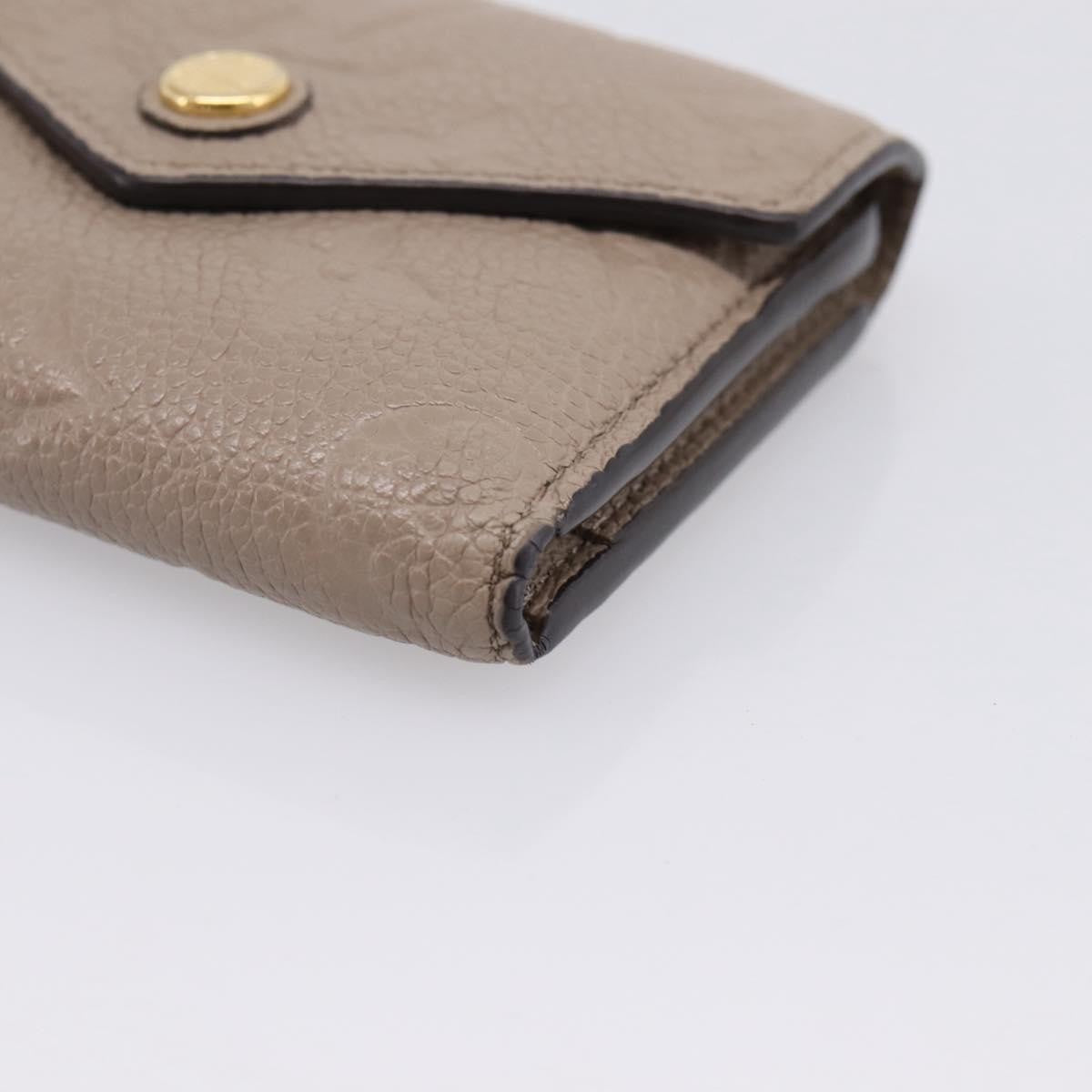 Louis Vuitton Zoe Monogram Empreinte Leather, Beige, Leather, Wallet
