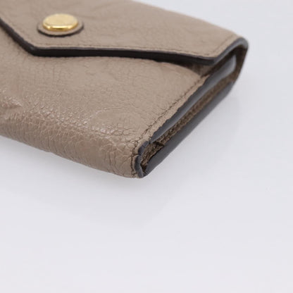 Louis Vuitton Zoe Monogram Empreinte Leather, Beige, Leather, Wallet