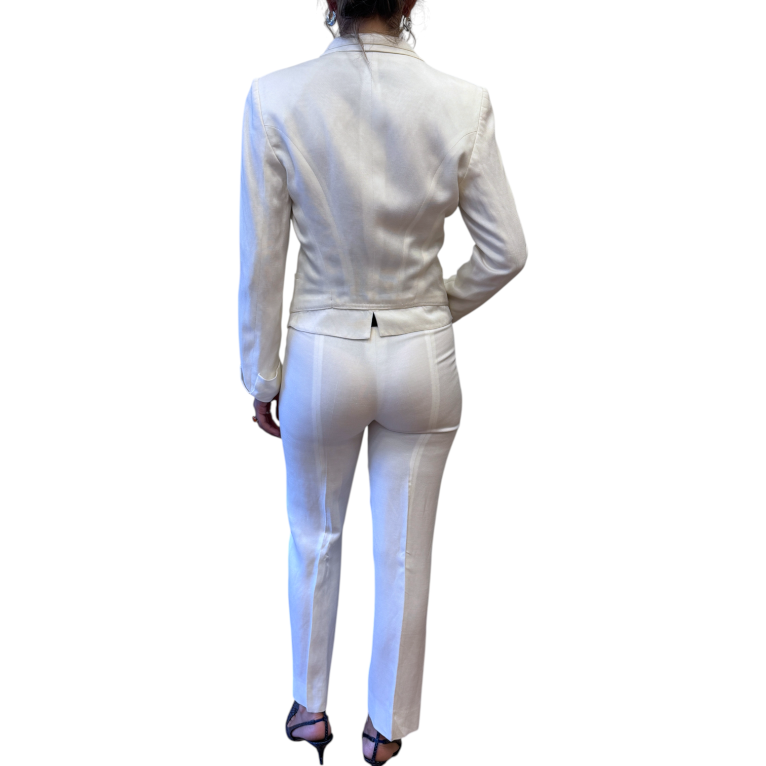 Brandsamsara white viscose and linen blend suit worn by a woman, back view showing tailored jacket and trousers.