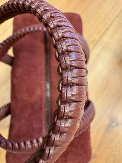 Brandsamsara Kallista brown suede leather handbag featuring a detailed braided handle