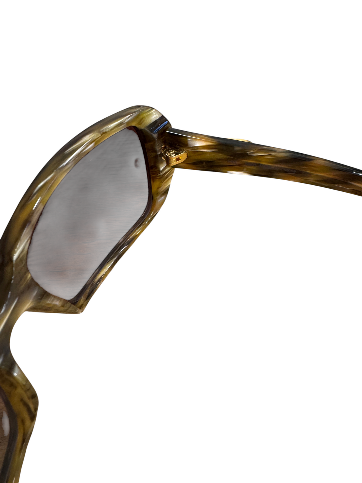 Brandsamsara Cartier sunglasses featuring a tortoiseshell acetate frame and medium tint lenses on a wooden surface.