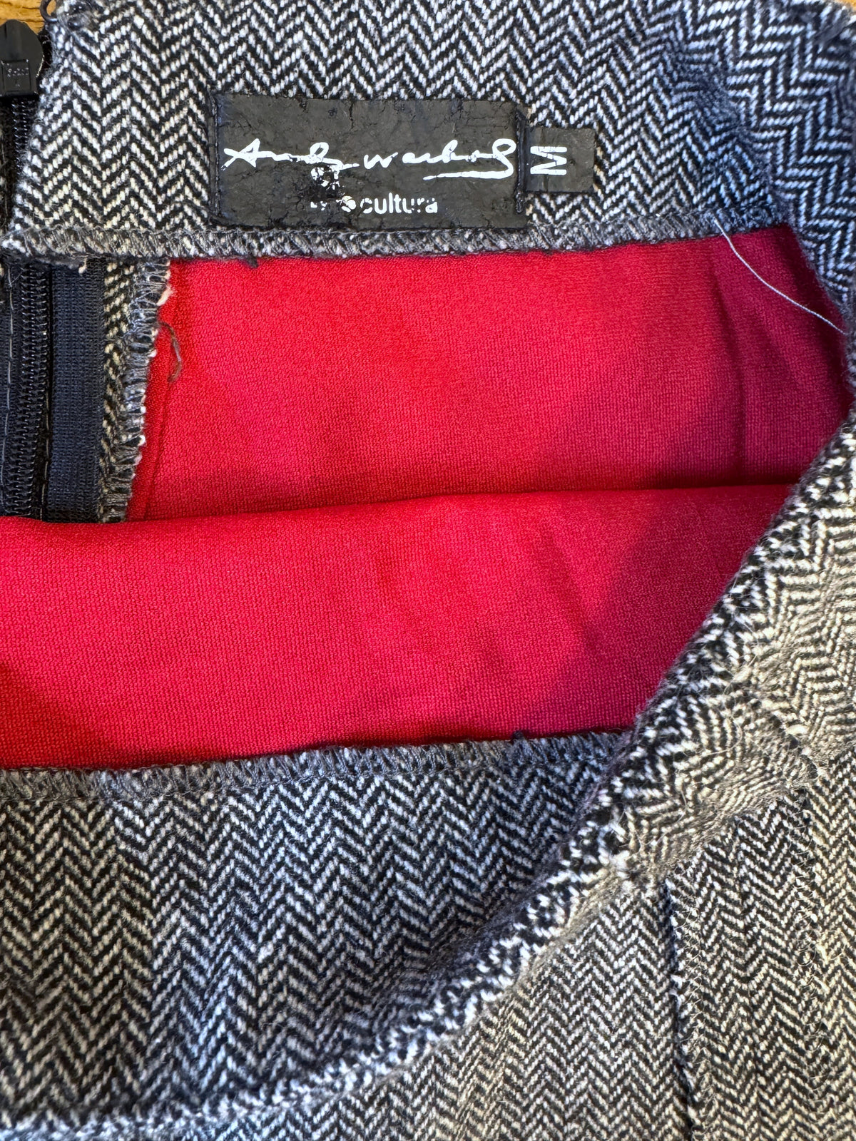 Brandsamsara Andy Warhol grey herringbone wool blend skirt with a vibrant red lining and side zipper detail.
