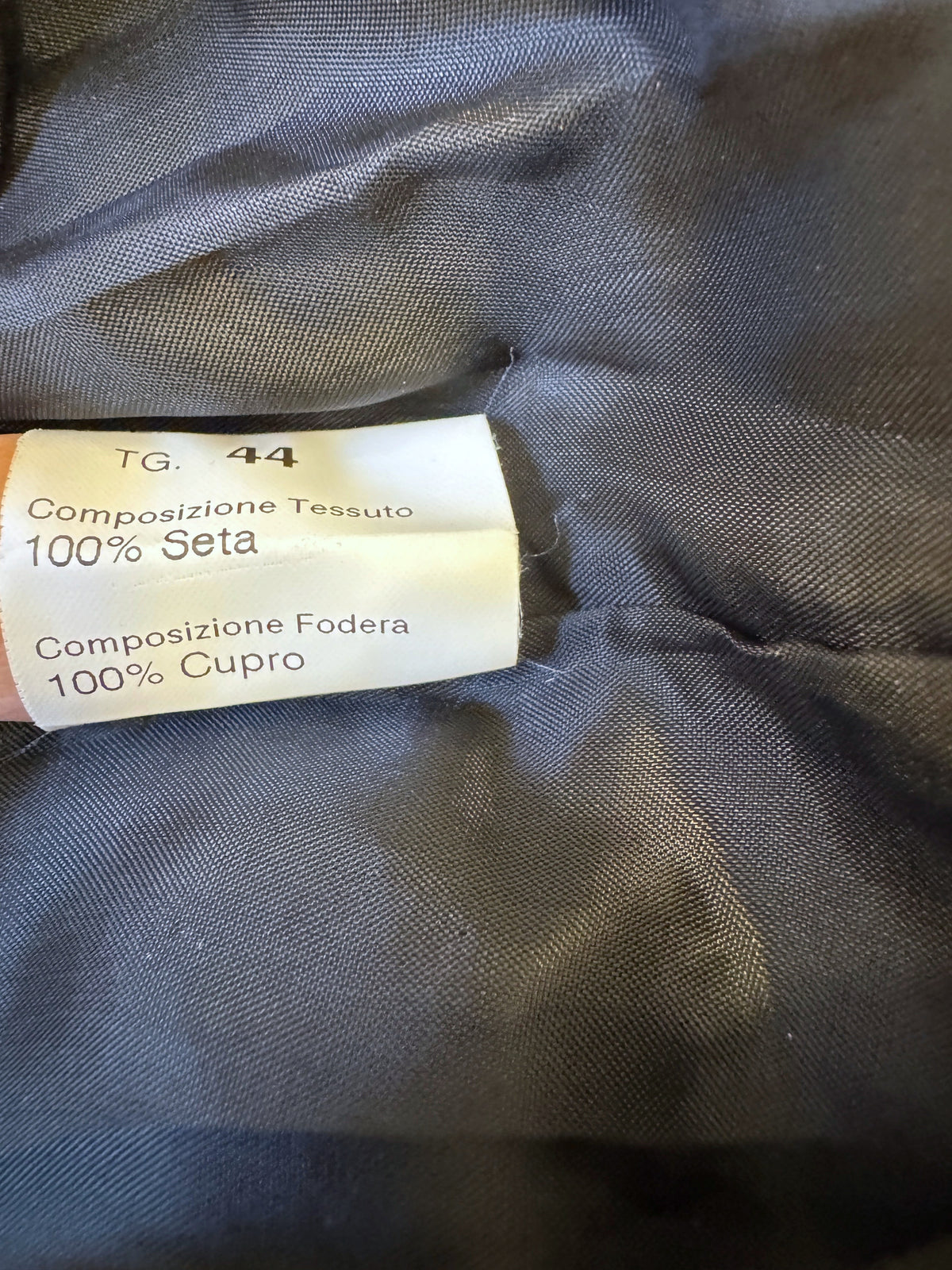 Brandsamsara Peserico black silk dress interior label showing 100% silk composition and cupro lining details