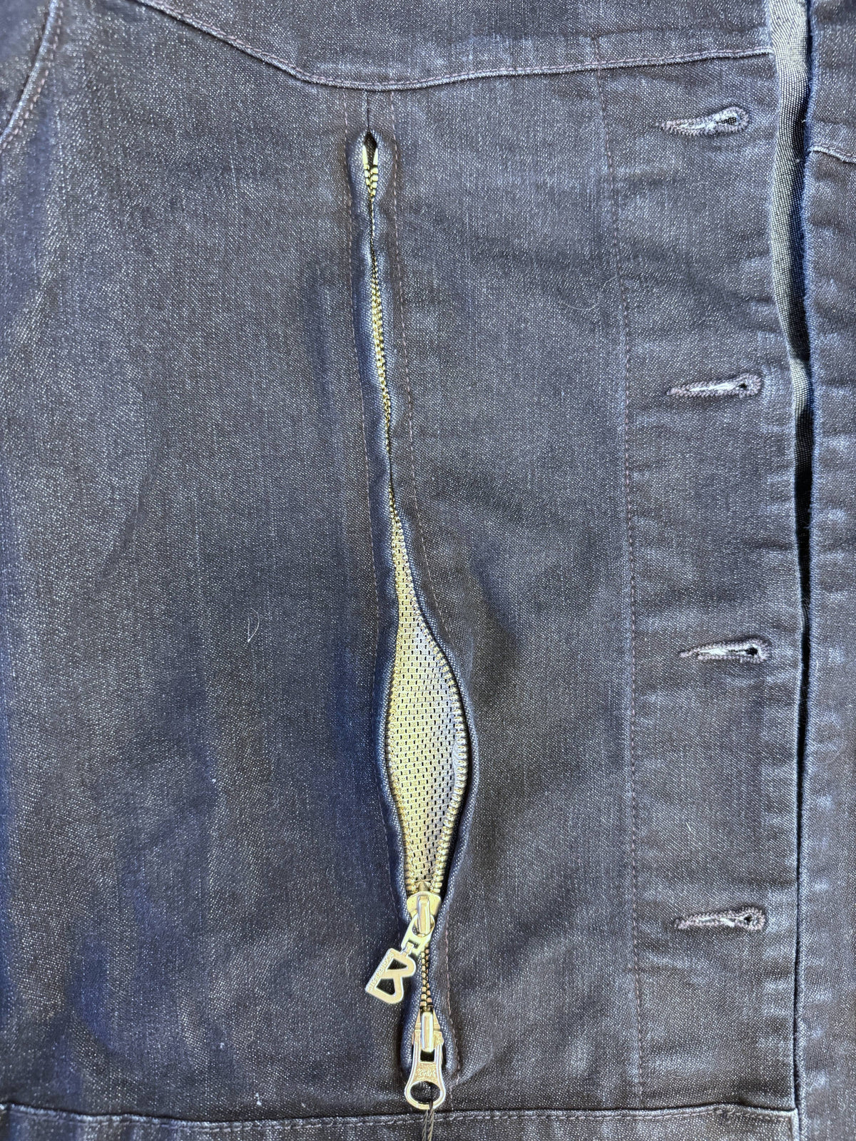 Brandsamsara Bogner blue cotton blend denim jacket with a zippered pocket and branded B zipper pull