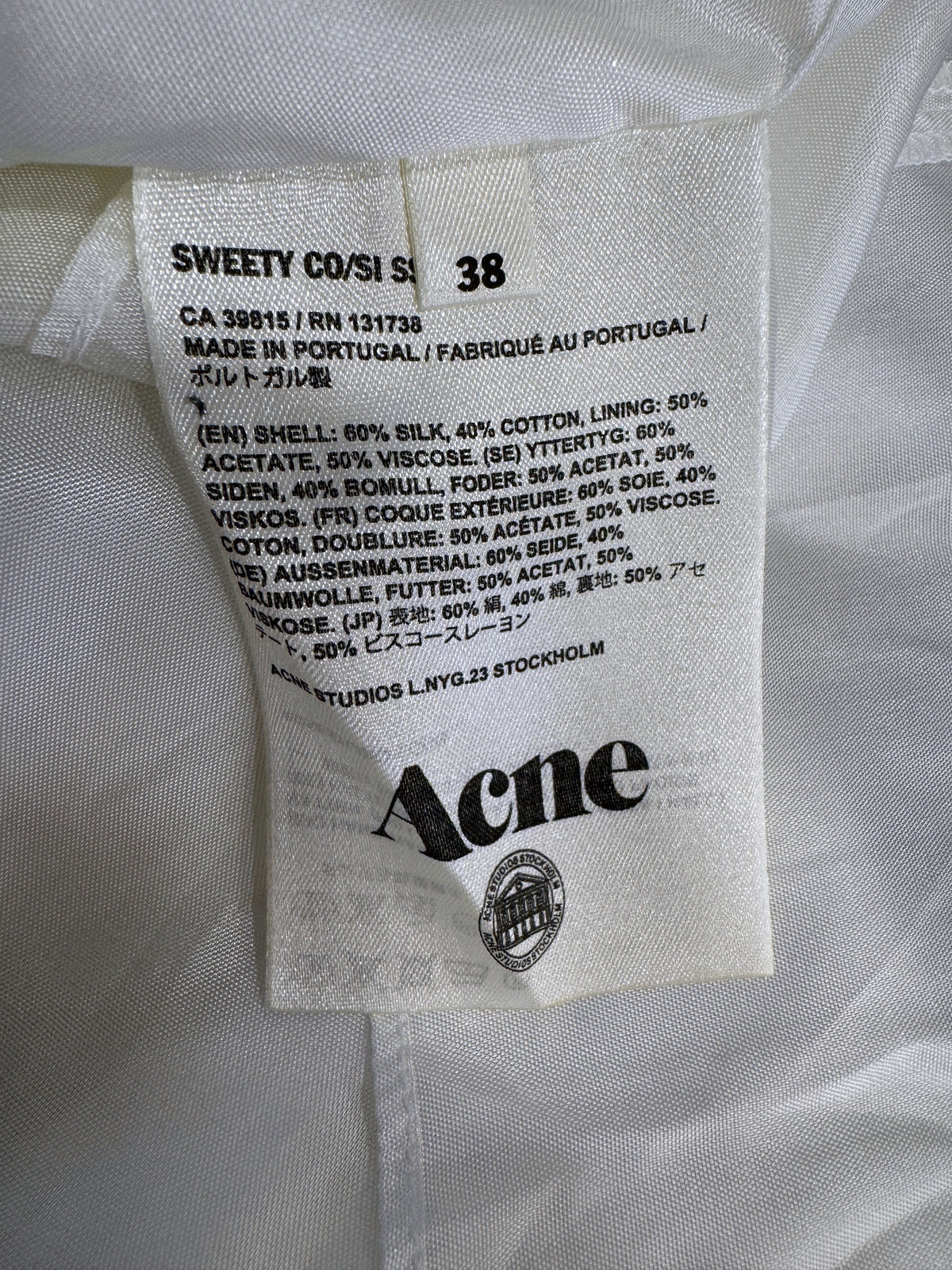 Brandsamsara Acne Studios dress care and composition label showing silk and cotton blend details