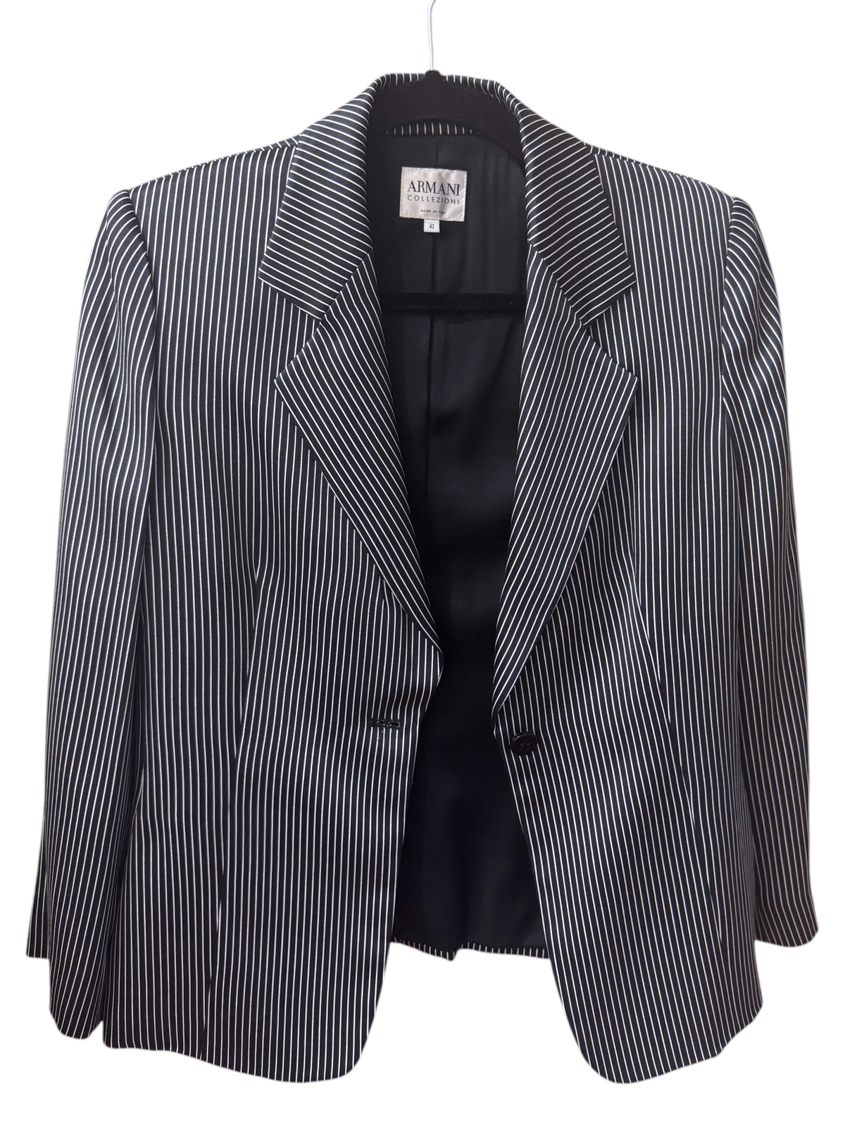 Brandsamsara Armani Collezioni black and white pinstriped silk suit jacket with long sleeves and polyester lining.
