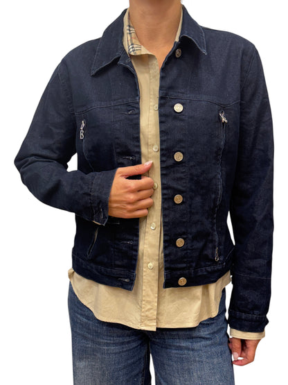 Brandsamsara dark blue cotton blend denim jacket with metal buttons and zippered pockets worn by a model