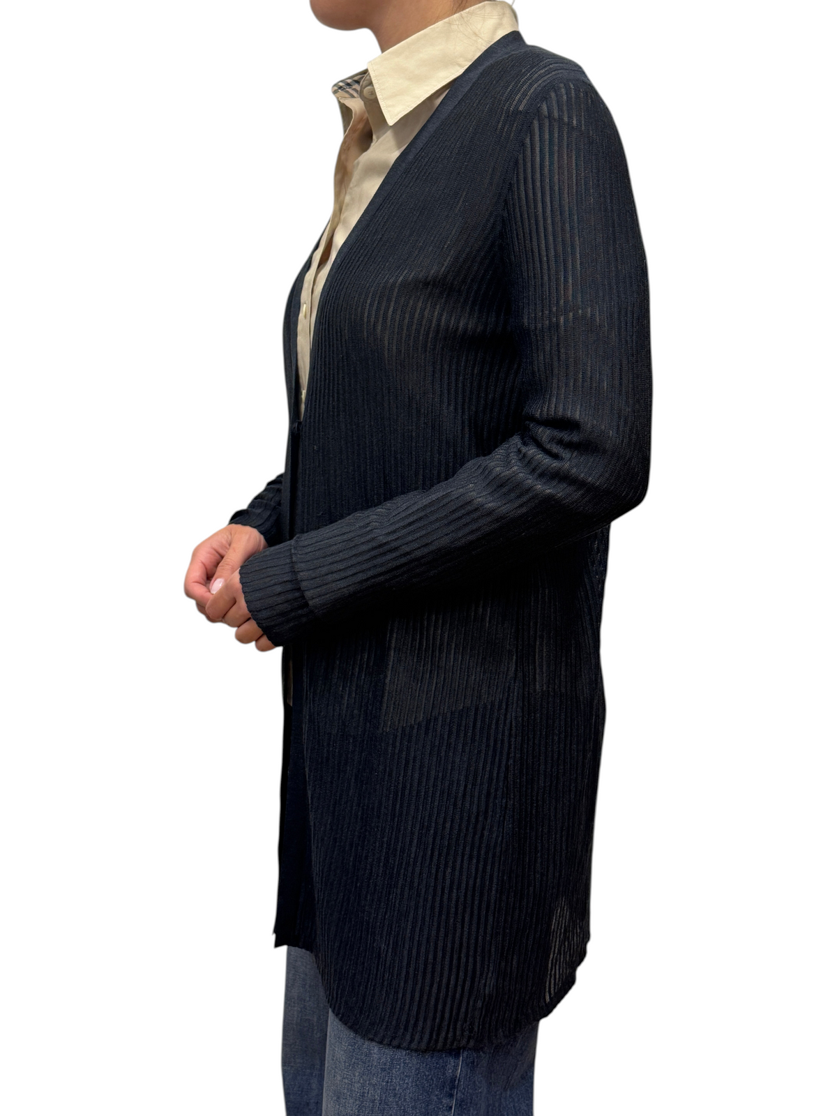 Brandsamsara Akris long sleeve navy blue silk ribbed cardigan worn over a beige collared shirt