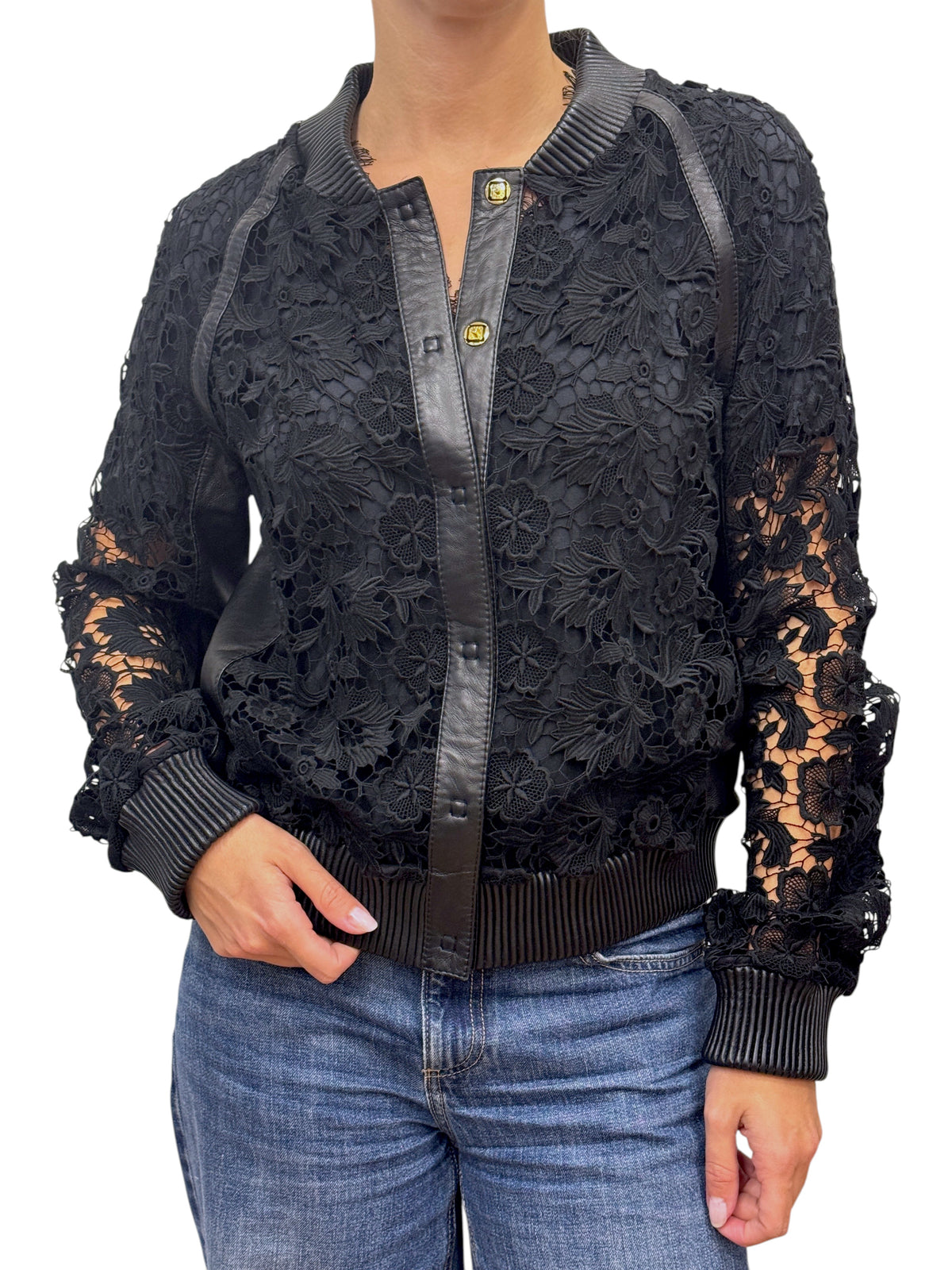 Brandsamsara black Escada jacket featuring intricate floral lace panels, leather trim, and ribbed collar and cuffs.