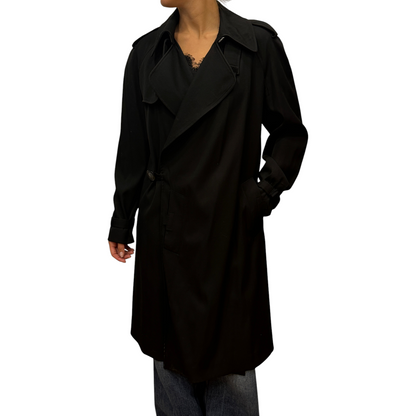 Brandsamsara Jean Paul Gaultier black trench coat with wide lapels and button detailing worn by a model