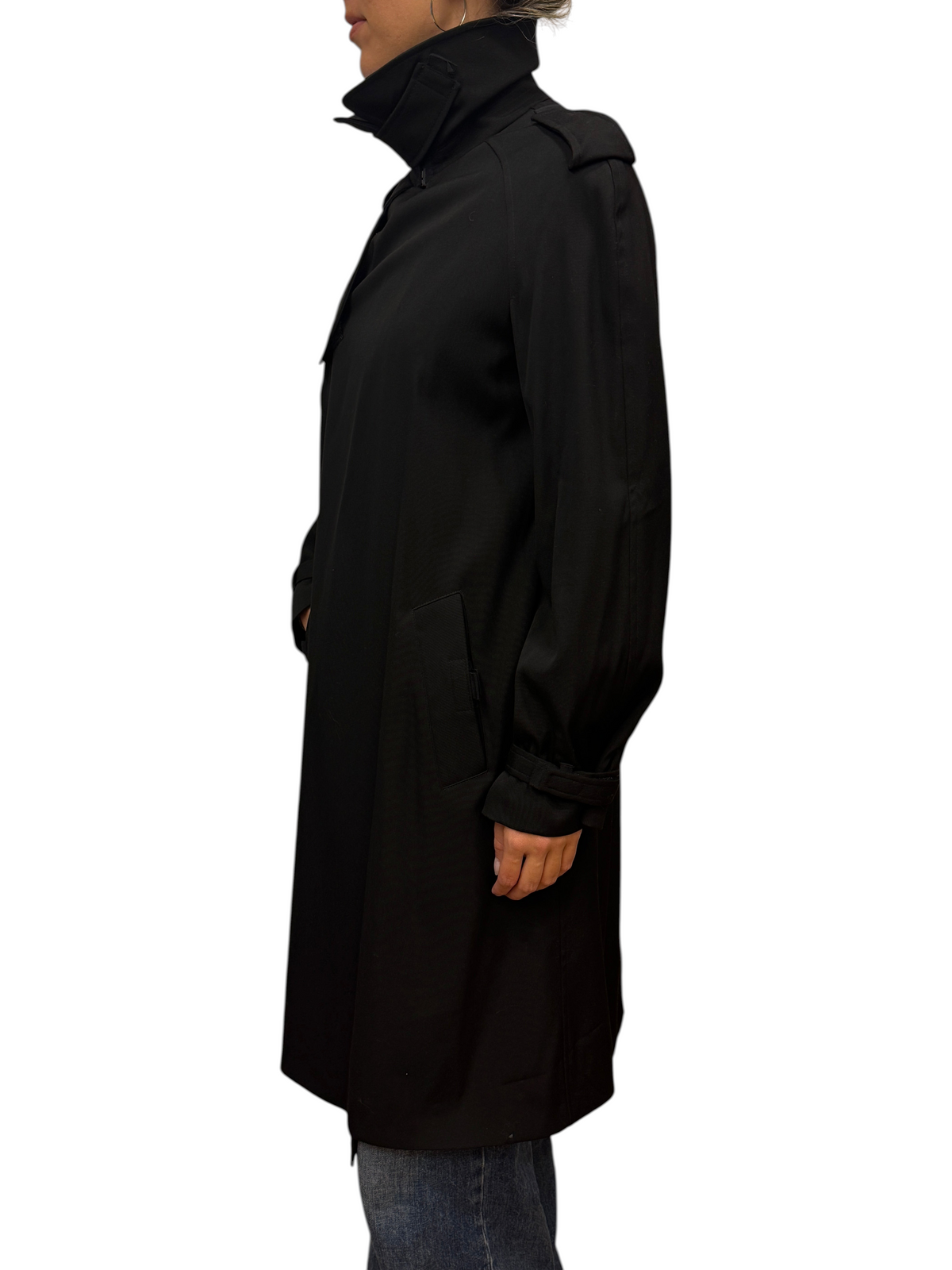 Brandsamsara Jean Paul Gaultier black trench coat with high collar worn by a model in profile view