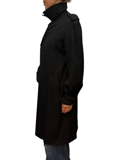 Brandsamsara Jean Paul Gaultier black trench coat with high collar worn by a model in profile view