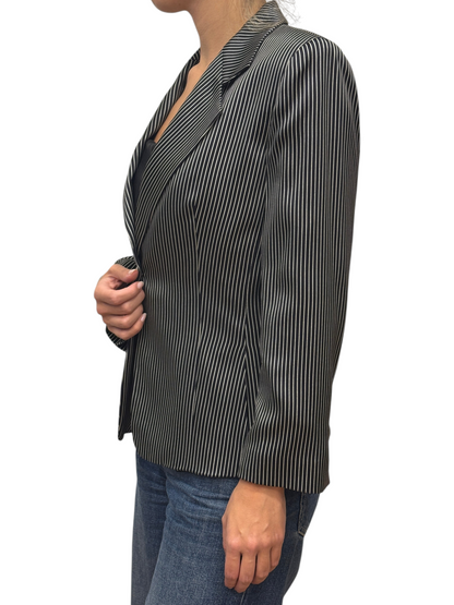 Brandsamsara Armani Collezioni black and white pinstriped silk blazer worn by a model in a side profile view