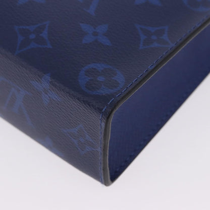 Louis Vuitton Pochette Voyage Monogram Taigarama, Blue, Leather, Clutch