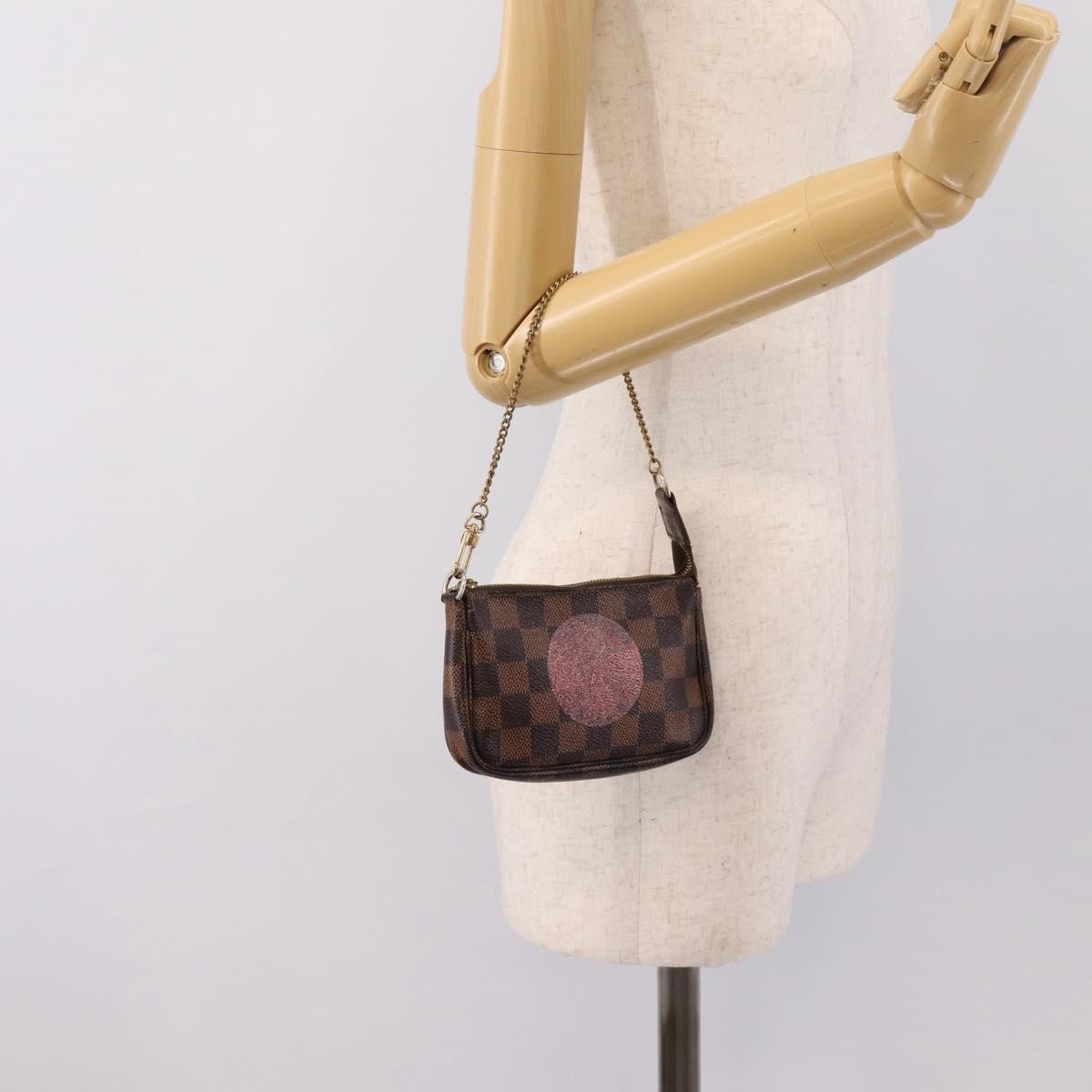Louis Vuitton Mini pochette accessoires Damier Canvas, Brown, Canvas, Clutch