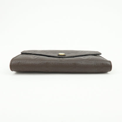 Louis Vuitton Curieuse Monogram Empreinte Leather, Brown, Leather, Wallet