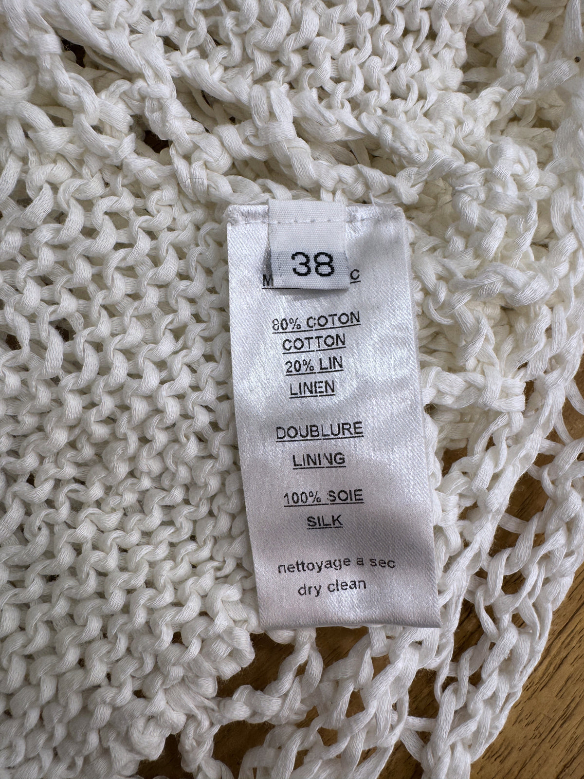 Brandsamsara Balmain white knitted dress care label showing cotton linen blend and silk lining composition