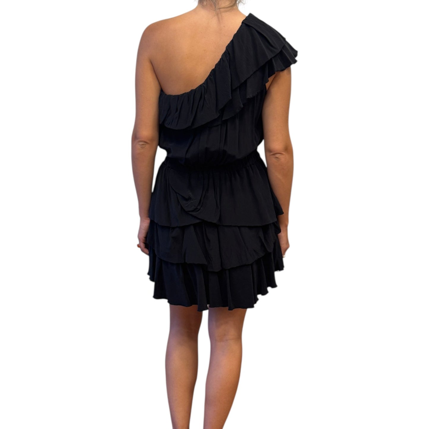 Brandsamsara black silk one-shoulder ruffled mini dress worn by a woman from the back view