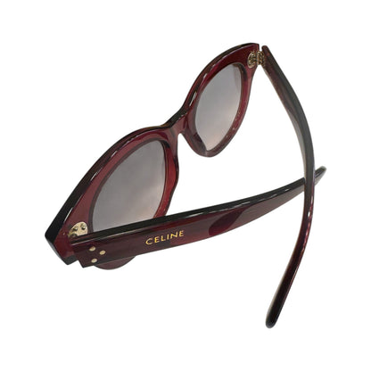 Brandsamsara Celine round-frame sunglasses in red acetate with three-dot temple hardware and gradient brown lenses