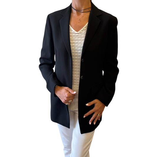 Brandsamsara Max&Co black wool long sleeve jacket with a tailored fit and button closure worn over a white top.