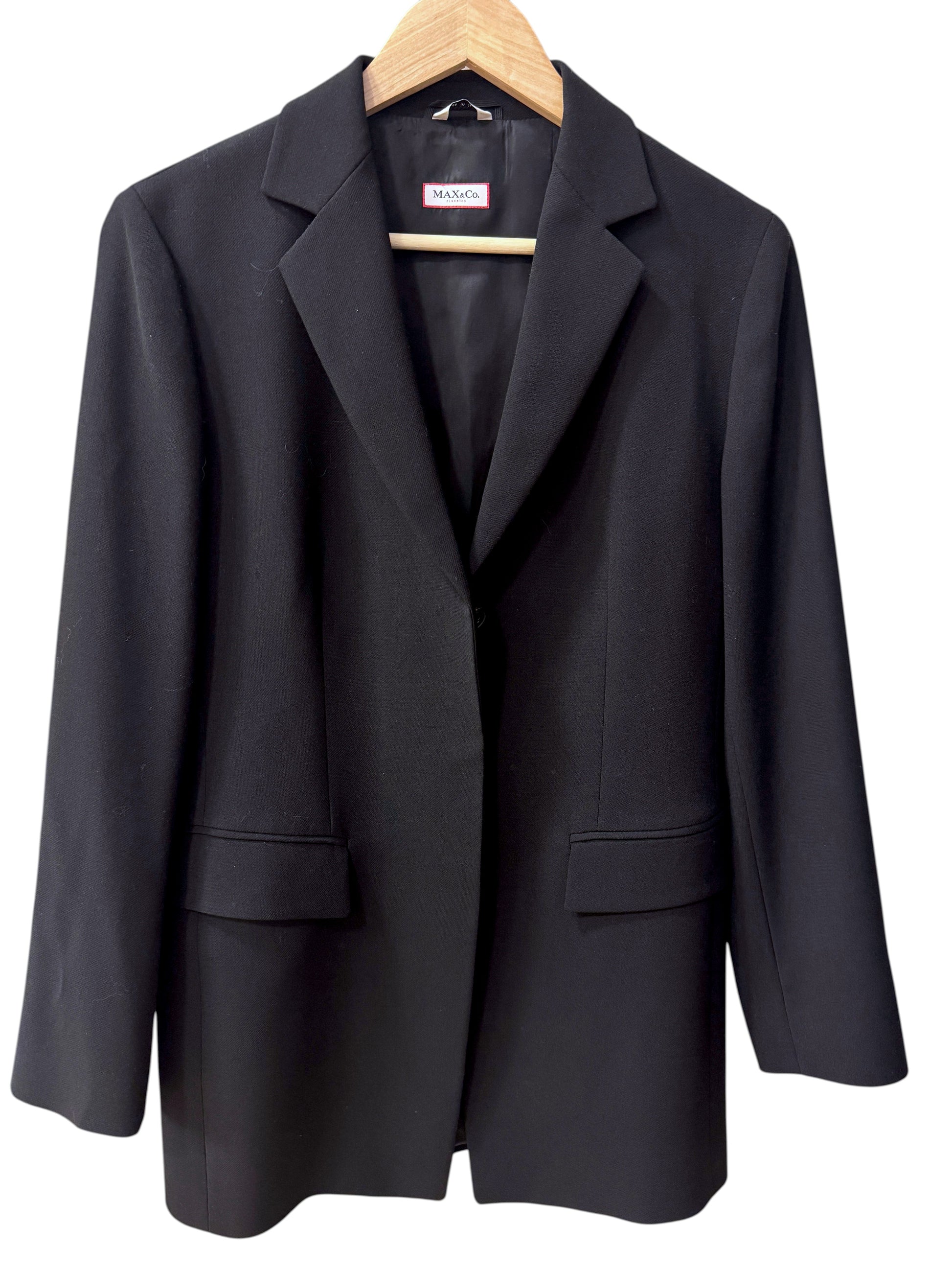 Brandsamsara Max&Co black wool jacket with long sleeves and a tailored lapel, hanging on a wooden hanger.