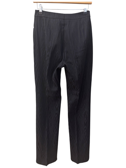 Brandsamsara Max & Co trousers in a black acetate blend with a subtle wavy textured pattern hanging on a hanger