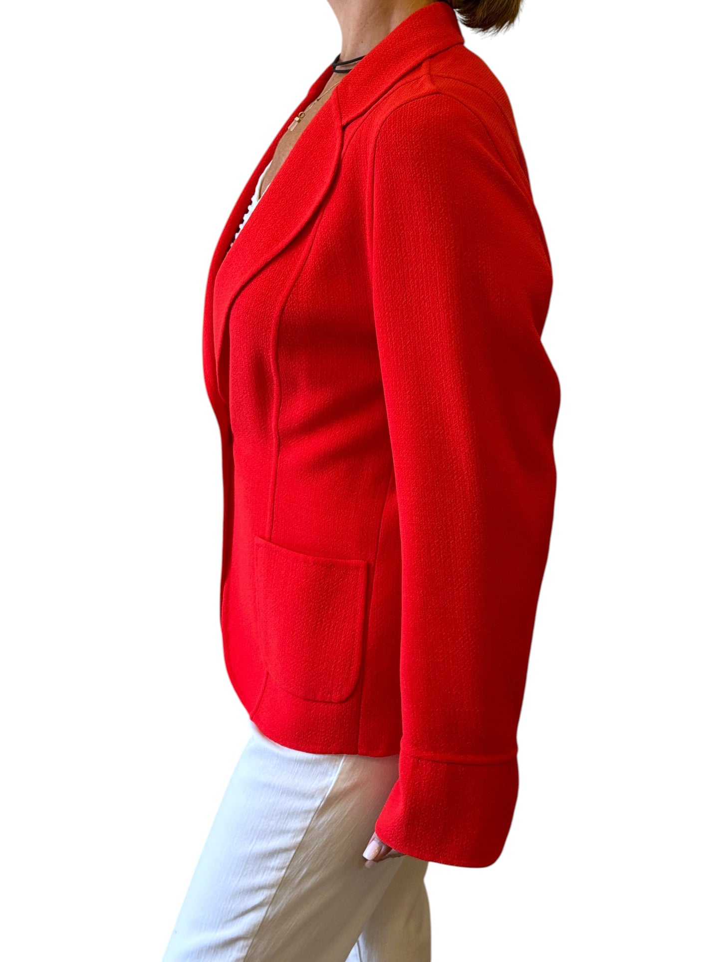 Brandsamsara orange Escada long sleeve jacket with a textured finish and front pockets, worn by a model.
